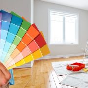 Professional man painter hand with colors. House renovation